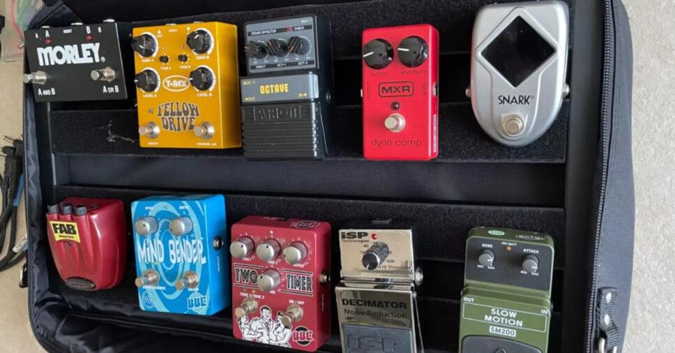 multiple guitar effects pedals with pedal board
