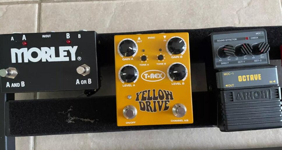 multiple guitar effects pedals with pedal board